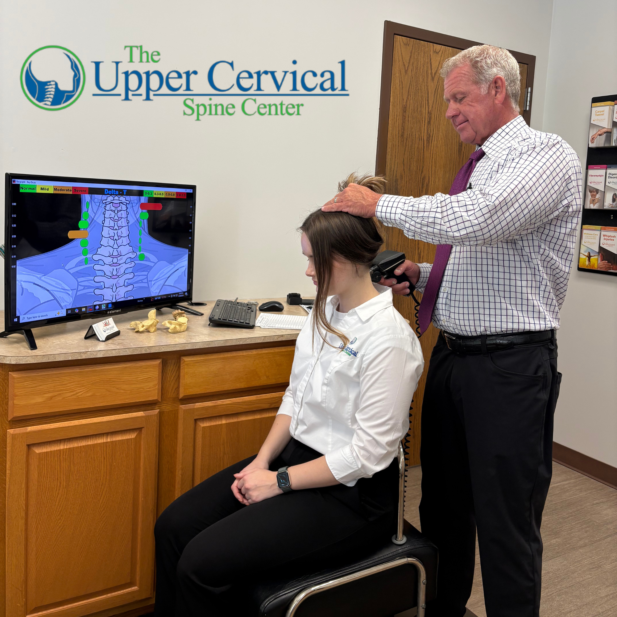 Dr. Ray Drury with a patient